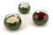 A Round Bowl Containing a Red Preserved Rose Set on Preserved Green Hydrangea.